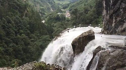 Dangerous_Waterfall_and_Road.jpg