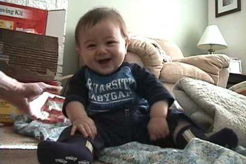 Baby_Laughing_and_Falling_Over.jpg