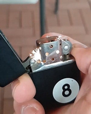 Slow_motion_lighting_of_a_lighter.jpg